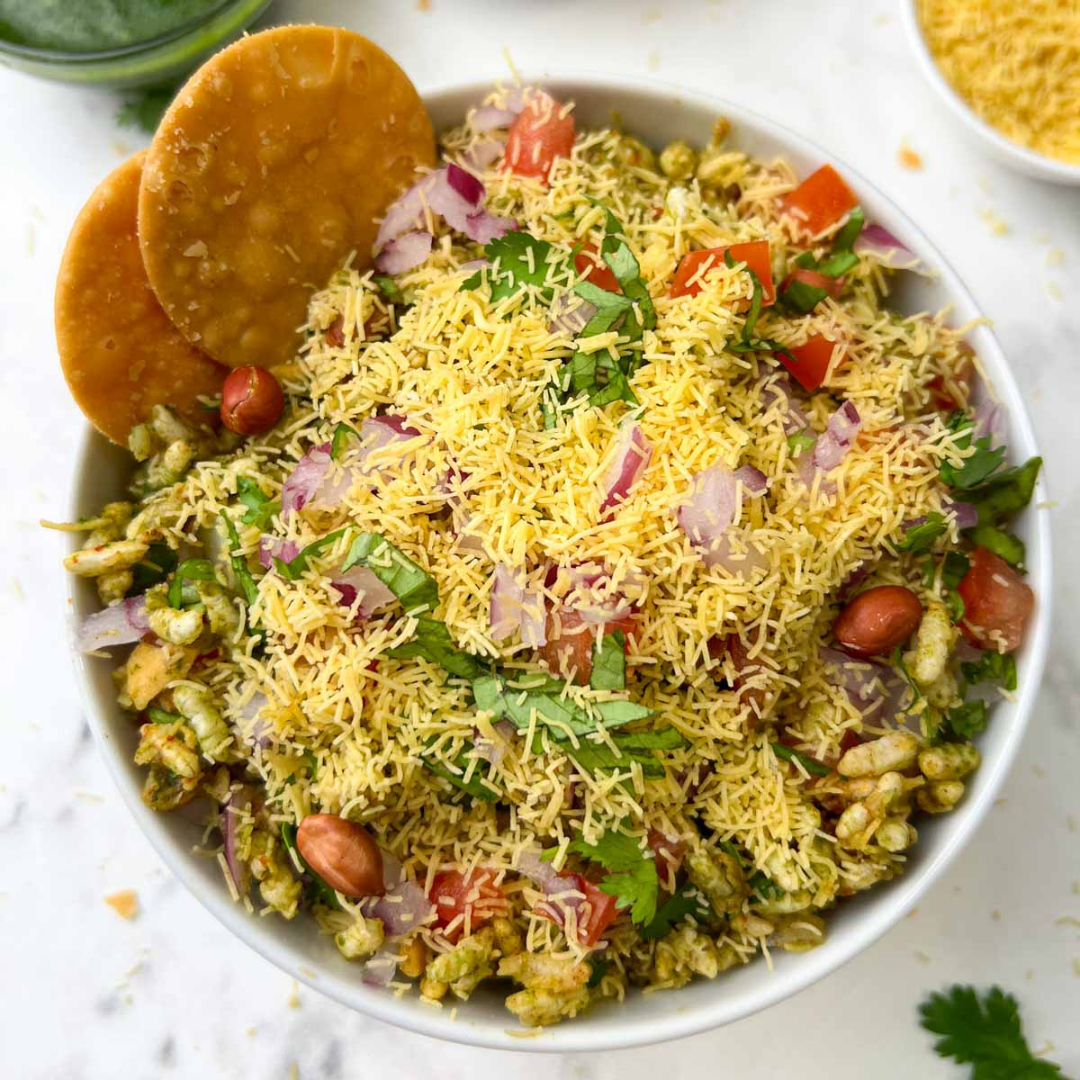 "How to make Bhel Puri at home" "Easy Bhel Puri recipe step by step" "Bhel Puri street food recipe" "Quick and simple Bhel Puri recipe" "Homemade Bhel Puri ingredients and preparation" "Healthy Bhel Puri snack recipe" "Best Bhel Puri recipe for beginners" "Authentic Indian Bhel Puri recipe" "Bhel Puri recipe with tamarind chutney" "What is the secret to making delicious Bhel Puri?"